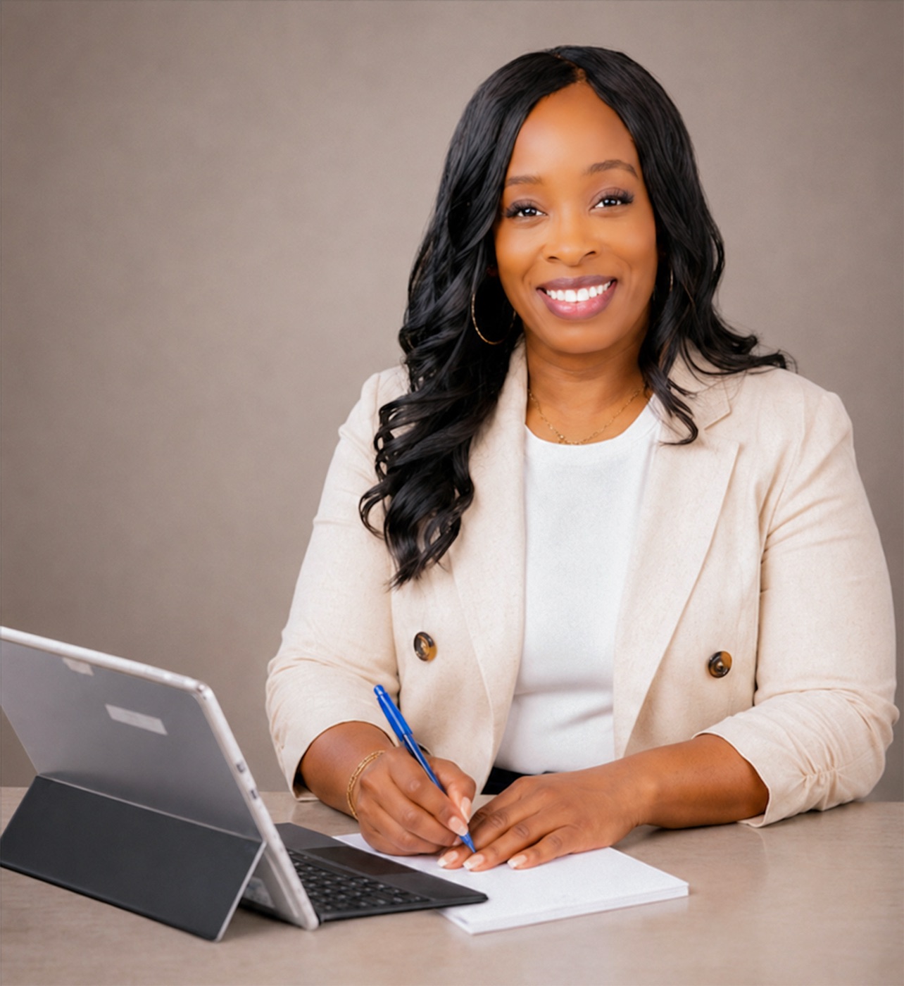 Professional portrait working at a desk