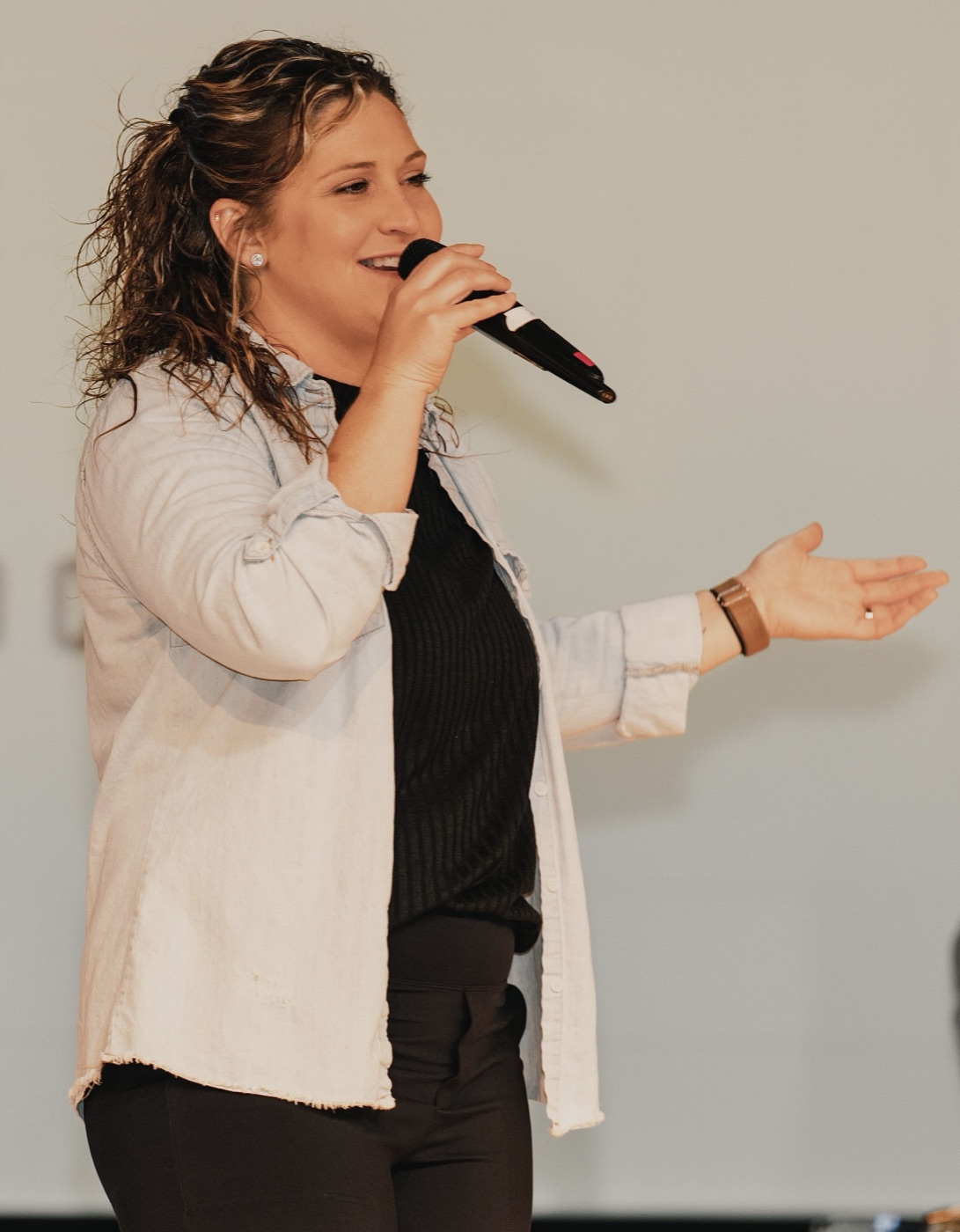 Presenter speaking to the audience at a conference